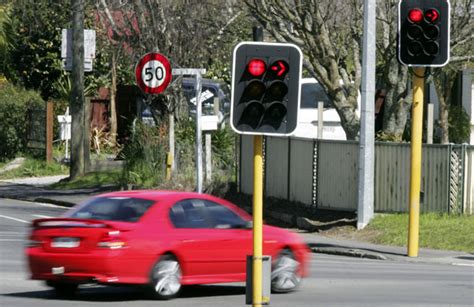 Does Running a Red Light Increase Insurance? And Why Do Traffic Lights Hate Mondays?